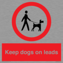 dogs-on-lead-symbol-with-black-text-on-white-background~